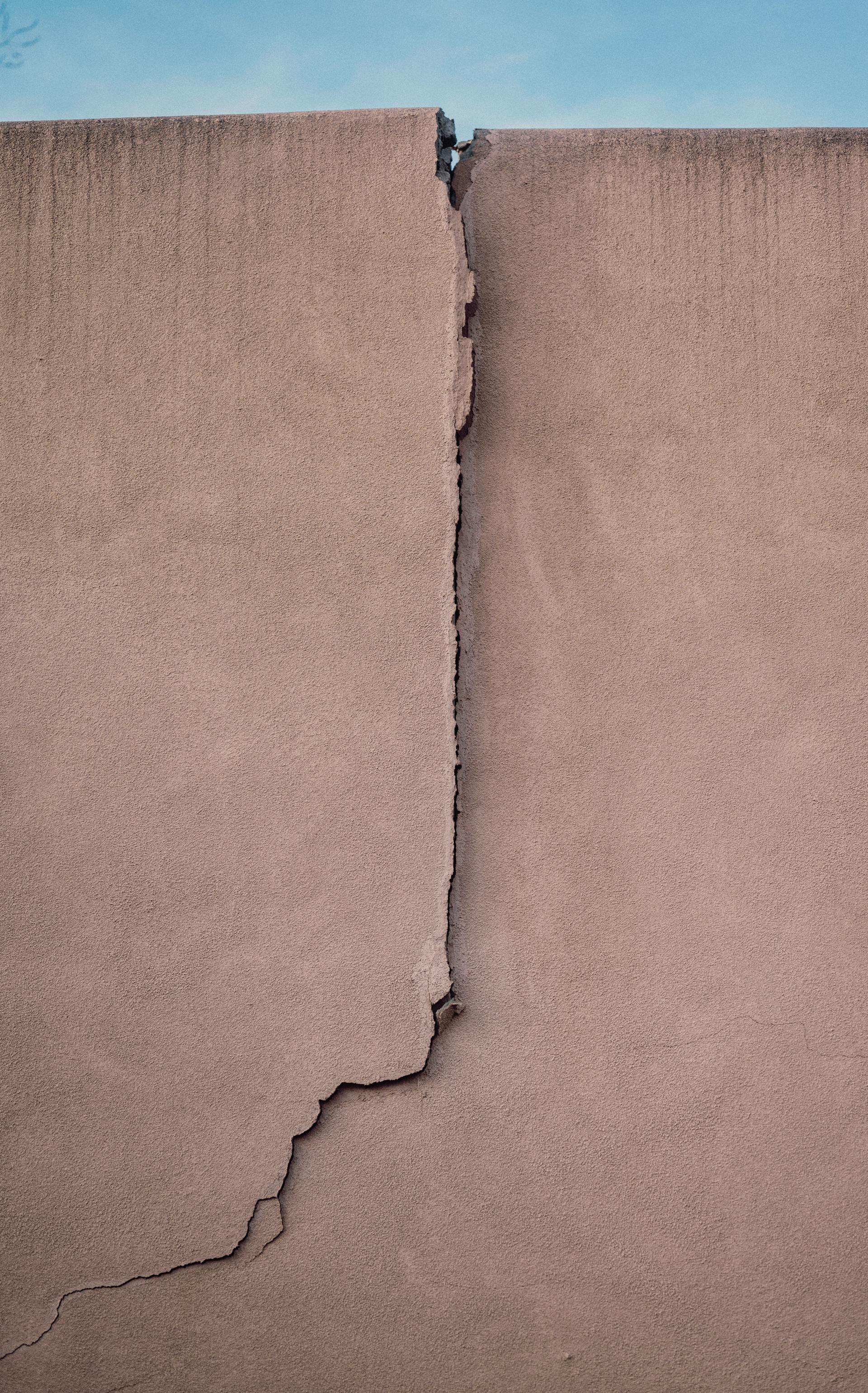 Stair-step foundation cracks on a Murfreesboro brick wall